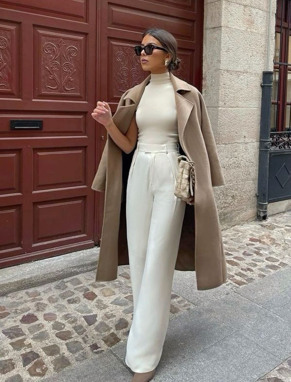 Elegant woman in beige coat